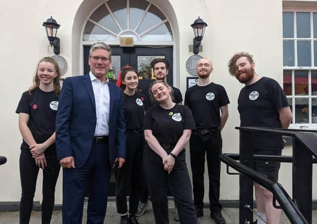 Labour leader Keir Starmer with staff from the Walled City Brewery.