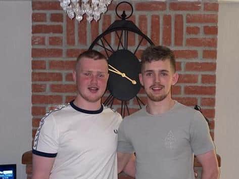 BROTHERS IN ARMS . . . Jamie McGonigle pictured with younger brother Kian during his 18th birthday celebrations recently.