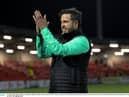 Rovers boss Stephen Bradley celebrates the win.