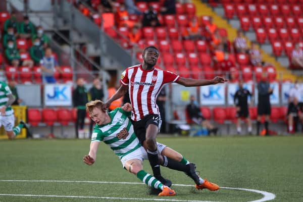 Derry City striker Junior Ogedi-Uzokwe is brought down by Shamrock Rovers defender Liam Scales.