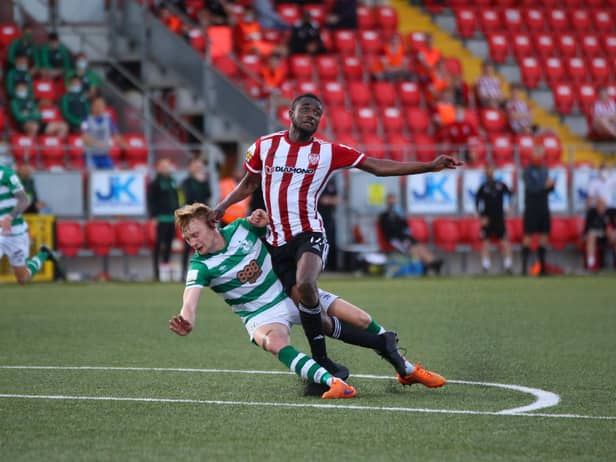Derry City striker Junior Ogedi-Uzokwe is brought down by Shamrock Rovers defender Liam Scales.