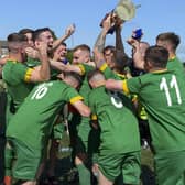 Foyle Harps players celebrate their Terry Kelly Cup Final victory over Top of the Hill Celtic, on Sunday afternoon. Picture by George Sweeney