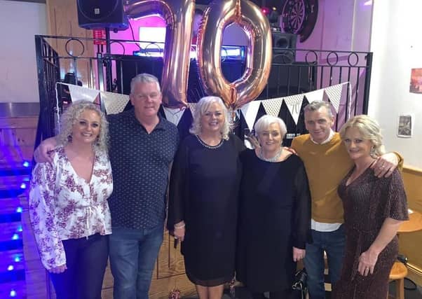Geraldine pictured with members of her family.