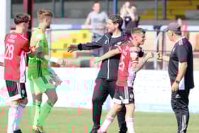 Derry City boss Ruaidhri Higgins celebrates the penalty shootout win with Evan McLaughlin, Nathan Gartside and Michael Harris. Photograph by Kevin Moore.