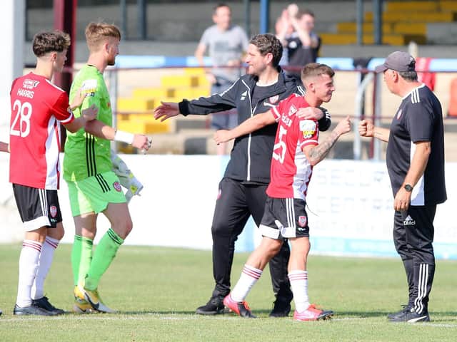 Derry City boss Ruaidhri Higgins celebrates the penalty shootout win with Evan McLaughlin, Nathan Gartside and Michael Harris. Photograph by Kevin Moore.