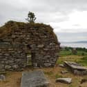 The site of an ancient monastery, cross and graveyard at Moville along the Wild Atlantic Way with the Causeway Coastal route in the background. Both routes are linked via Derry City. (Photo: Brendan McDaid)