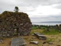 The site of an ancient monastery, cross and graveyard at Moville along the Wild Atlantic Way with the Causeway Coastal route in the background. Both routes are linked via Derry City. (Photo: Brendan McDaid)