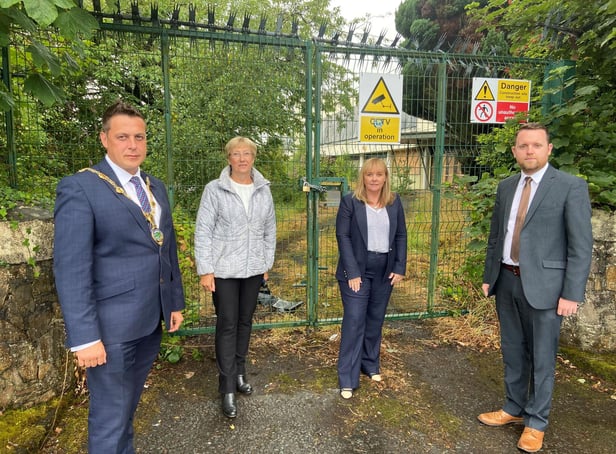 Mayor Alderman Graham Warke, Alderman Hilary McClintock, Education Minister Michelle McIlveen and Gary Middleton MLA at the former Faughan Valley High School site.