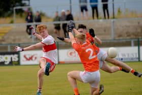 Armagh’s Matthew McCaughley and Emmet Magee fail to stop Niall O’Donnell of Derry having a shot at goal. (Photo: George Sweeney). DER2130GS – 034