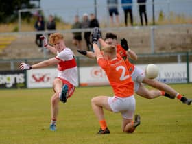 Armagh’s Matthew McCaughley and Emmet Magee fail to stop Niall O’Donnell of Derry having a shot at goal. (Photo: George Sweeney). DER2130GS – 034