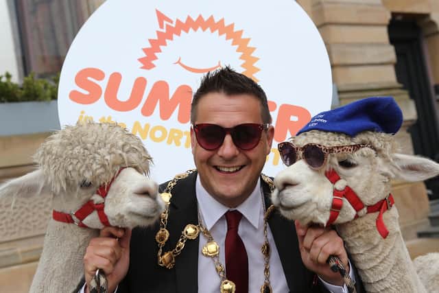 Hey buddy... Mayor of Derry & Strabane Graham Warke with two cool customers from Wild Alpaca Way in Inishowen, County Donegal.