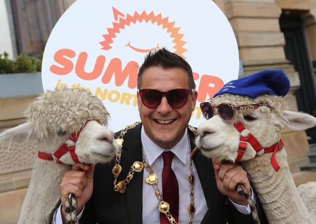 Hey buddy... Mayor of Derry & Strabane Graham Warke with two cool customers from Wild Alpaca Way in Inishowen, County Donegal.