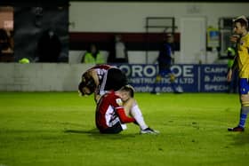 Derry City players drop to the floor after a hugely disappointing performance on the opening night of the season in Longford.