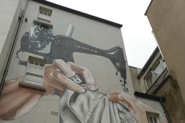One of the Factory Girls murals in the Craft Village in Derry. (Photo: Brendan McDaid)