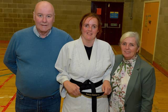 LTYC Judo Club member Roisin Doherty pictured with her parents Dermot and Caroline O’Hara, earlier this week, after she received an Honorary Black Belt from the NI Judo Federation, in recognition of her achievements. DER2131GS – 038