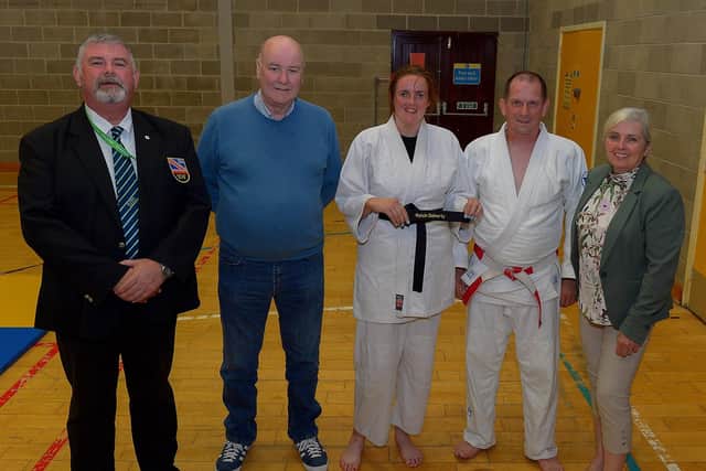 LTYC Judo Club member Roisin Doherty pictured with Russell Brown, Vice-Chair, NI Judo Federation, Jim Toland Senior Judo coach LTYC, and her parents Dermot and Caroline O’Hara, after she received an Honorary Black Belt from the NI Judo Federation, in recognition of her achievements. DER2131GS – 039