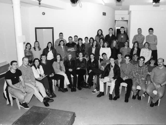 Brian McGuigan (far right) and some of the staff and members of Reach Across at a reception in the Nucleus prior to their first anniversary in August 1996.