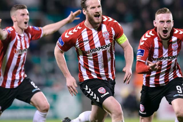 Ryan McBride pictured with teammates Harry Monaghan and Ronan Curtis while playing for Derry City.