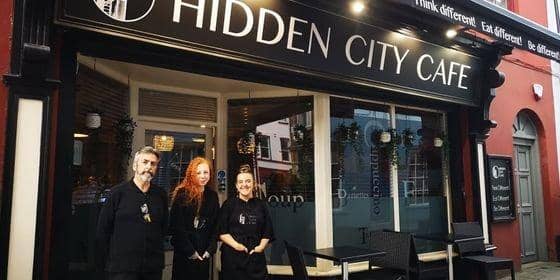Justyn McNicholl, owner Hidden City Cafe front of house staff, Bekah Devine, and the Assistant Manager Tori Messenger.