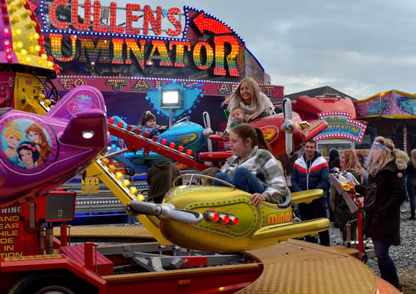 Enjoying the fun at Cullen’s Amusements, in Ebrington. DER2027GS - 019