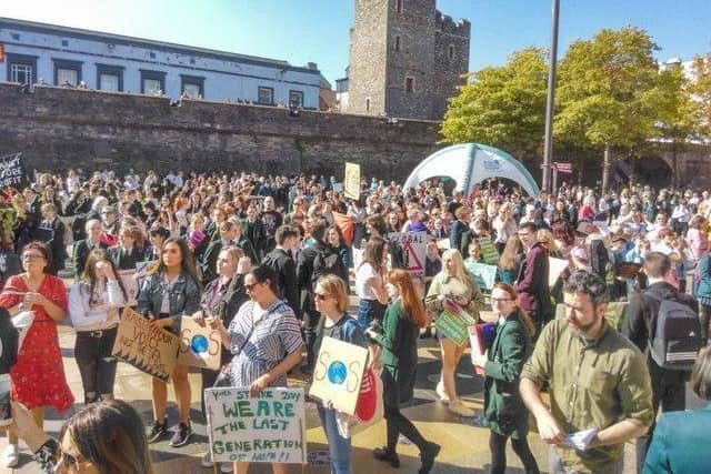 Young people staging a Climate Strike in Derry previously.