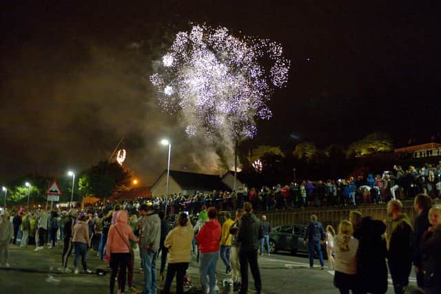 Spectators enjoy the fireworks display at the Gasyard Feilé’s Festival of Fire at Free Derry Wall back in 2019. DER3319GS - 061