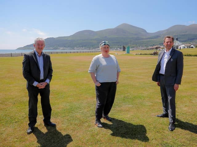 PIC SHOWS: Actress Siobhán McSweeney; with John McGrillen, Chief Executive of Tourism NI (left); and Shane Clarke, Tourism Ireland’s Director of Corporate Services, Policy & Northern Ireland (right), during filming for Exploring Northern Ireland with Siobhán McSweeney, in Newcastle, Co Down.