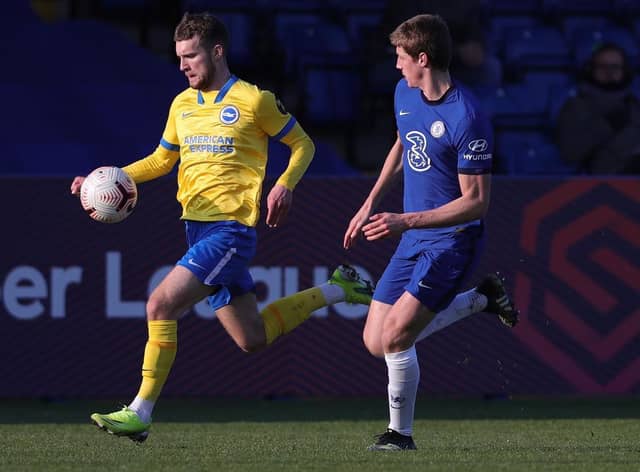 Brighton striker Ben Wilson on the attack against Chelsea U23s last season.