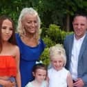 Tamzin White, pictured with her late mother, Louise, sisters and father James.