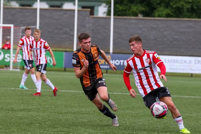 Derry City's Evan McLaughlin races away from Dundalk's Sam Stanton. Picture by Kevin Moore/MCI