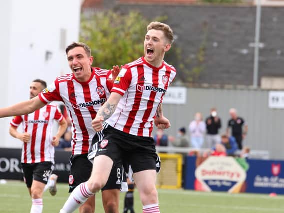 Derry City's Jamie McGonigle races away celebrating after giving his side the lead against Dundalk. Picture by Kevin Moore/MCi