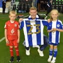 James McClean with his daughter Allie-Mae and son Junior at the DW Stadium last night.