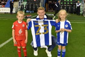 James McClean with his daughter Allie-Mae and son Junior at the DW Stadium last night.