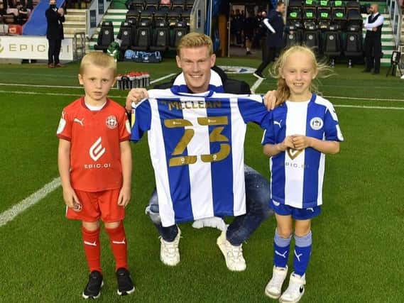 James McClean with his daughter Allie-Mae and son Junior at the DW Stadium last night.