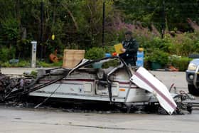 Police officers attend the  site on Ballyarnett Road this afternoon after a mobile home was destroyed by fire. DER2133GS – 021