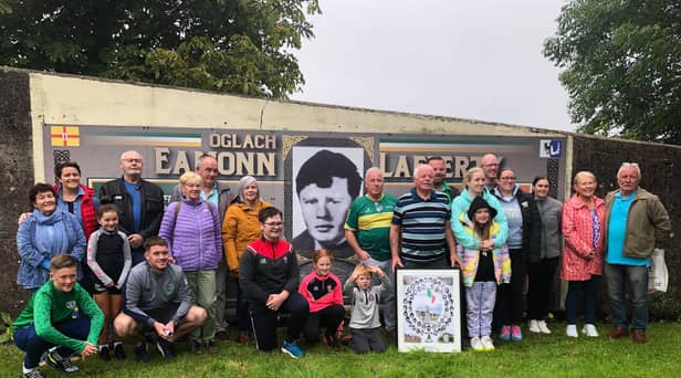 Members of Eamonn Lafferty’s family at the mural in his memory at Kildrum Gardens.