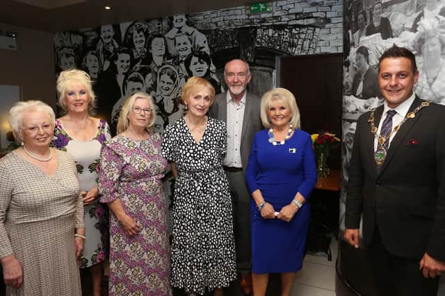 Patrick Durkan and the Mayor Graham warke pictured with group of factory girls. L - R:  Isabel Doherty, Irene McCarron, Claire Moore, Mary Doherty and Mary White. (Photos: @Lorcan Doherty)