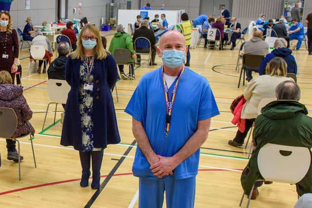 Western Trust staff and people awaiting vaccination at  a previous clinic at Foyle Arena earlier this year. Picture Martin McKeown. 28.01.21