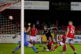 Derry City's Ronan Boyce fires home their winner past Sligo Rovers goalkeeper Ed McGinty. Picture by Kevin Moore/MCI