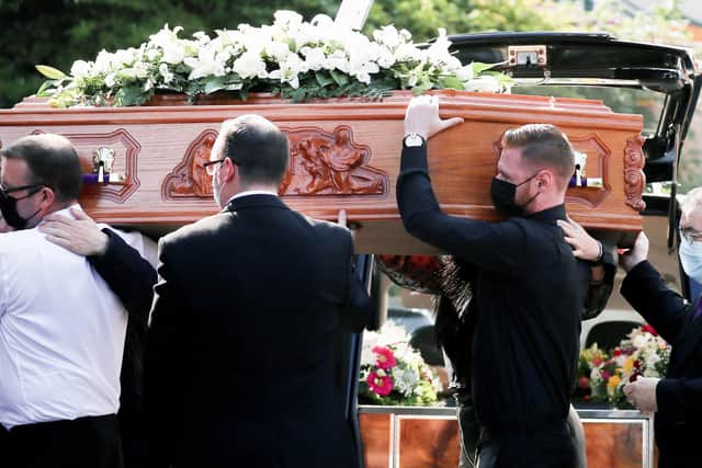 Samantha Willis' coffin being carried at her funeral today.