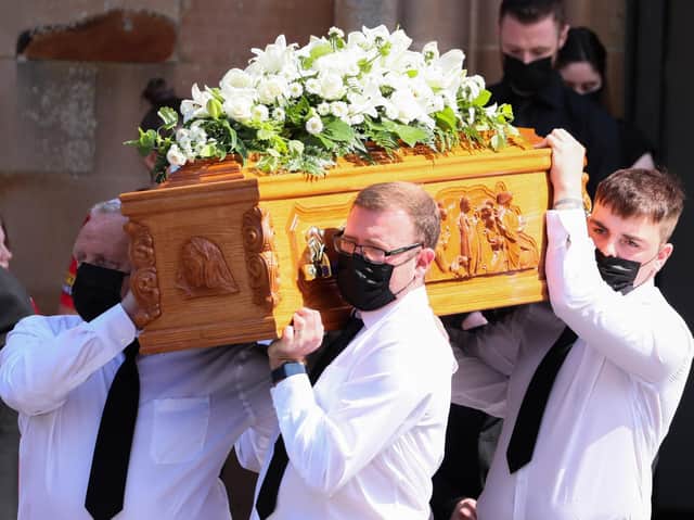 Samantha Willis’ husband Josh Willis(front right) and her father Lawrence Moore (front left) help carry her coffin after the funeral service at Saint Columbs Church in Derry. Picture by Jonathan Porter/PressEye