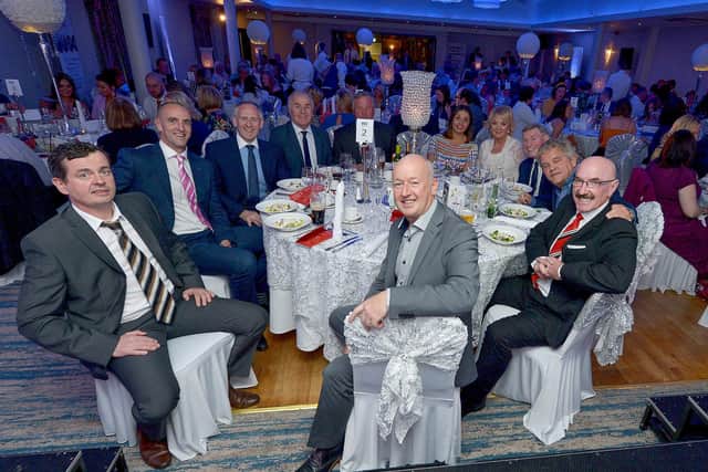 Paul McLean, managing director, BetMcLean, principle sponsor,third from left, pictured with is guests at the Derry Journal People of the Year Awards back in 2019. DER3619GS – 064