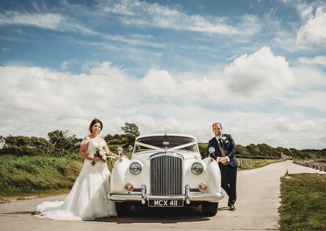Drive in style on the big day.  (Photo by James Aiken Photography)