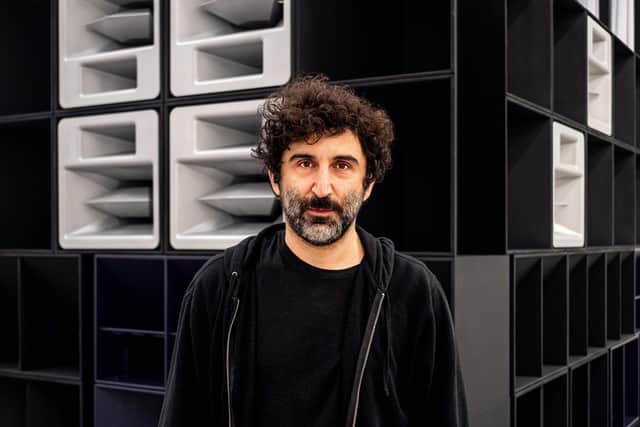 Cevdet Erek in front of Bergama Stereo in Hamburger Bahnhof, Berlin 2019. Photograph by Mathias Voelzke.