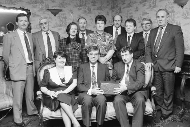 LOOKING BACK.... Bernard McGuinness, second from right standing, with others at the Fine Gael (Inishowen) annual dinner dance at the Strand Hotel in March 1994.