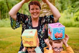 Caitrin Kincaid with her sons Cooper and Carter and the toy Cubefun