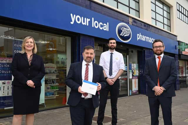 Pictured launching the Pharmacy Collect service for rapid COVID-19 tests are (L-R) Chief Pharmaceutical Officer, Cathy Harrison; Health Minister Robin Swann; Pharmacist Ryan McCullough, and Vice-Chair of Community Pharmacy NI, Peter Rice. Picture: Michael Cooper