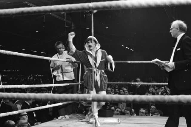 CORNER MAN . . .  Charlie Nash enters the ring at the Kelvin Hall, Glasgow for his world title challenge against Jim Watt as Tommy Donnelly prepares his corner.