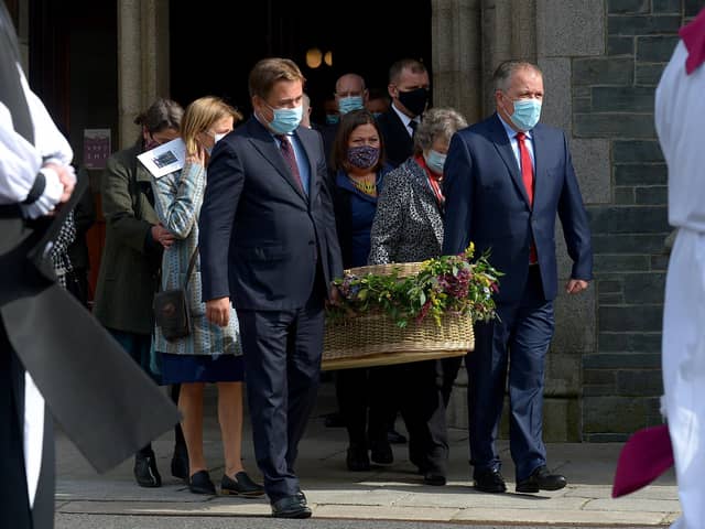 The coffin of Pat Hume is carried by her children from St Eugene’s Cathedral after Requiem Mass on Monday morning.  Photo: George Sweeney.  DER2136GS – 049