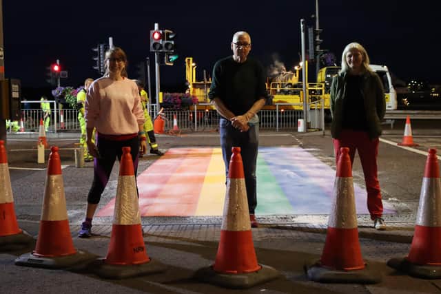 Catherine Hemelryk, Jim Doherty and Shá Gillespie at Derry's new rainbow crossing.